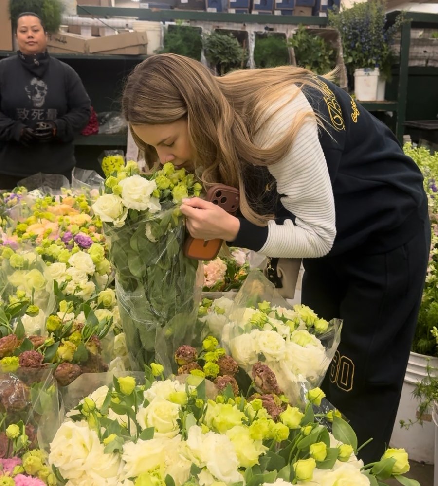 florist choosing fresh flowers at Los Angeles flower market